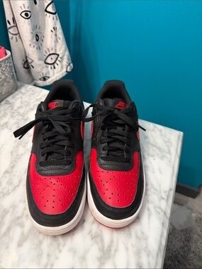 Nike  Men’s Black & Red Low-Top Sneakers with White Midsole